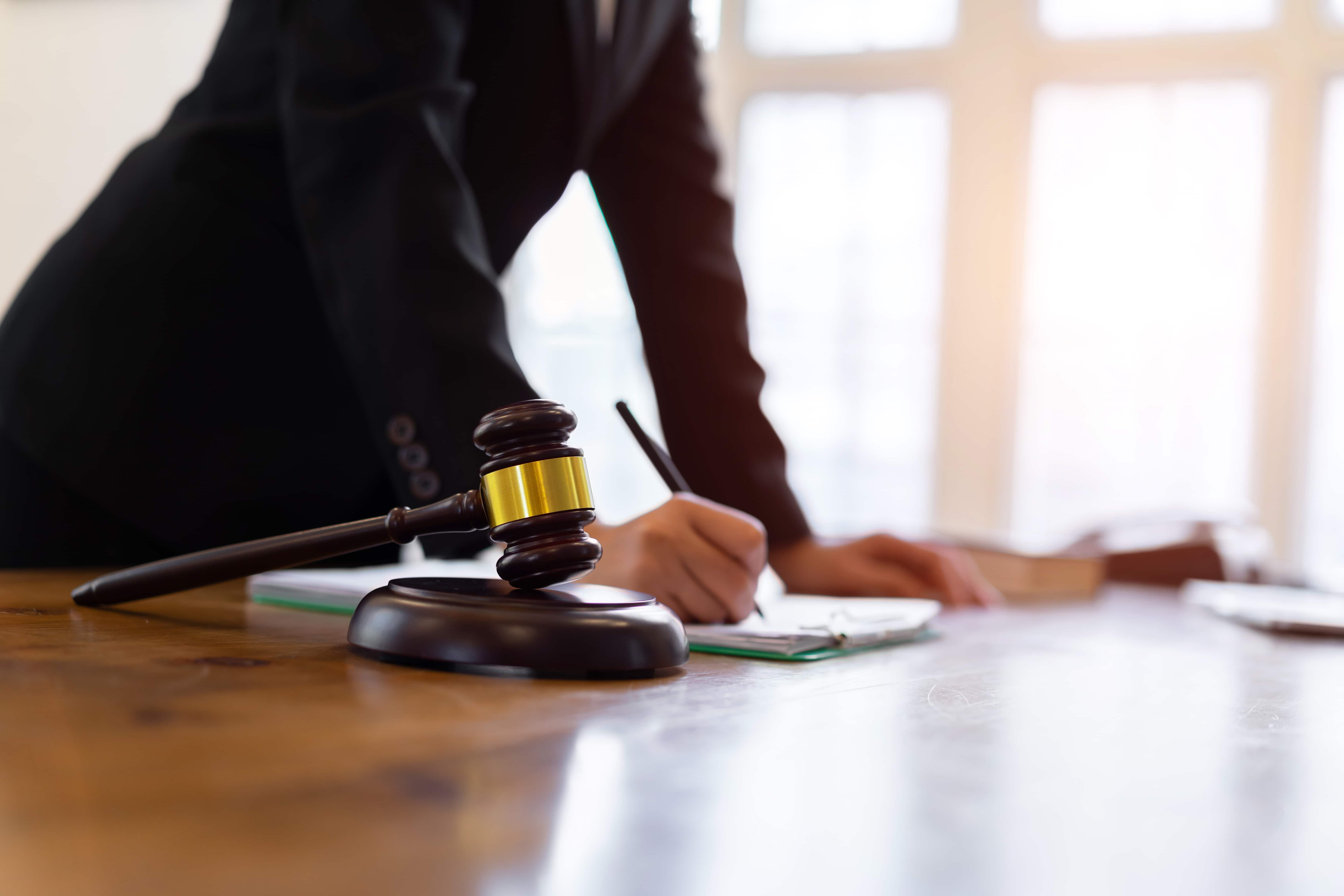 An attorney provides small business legal services to a client.